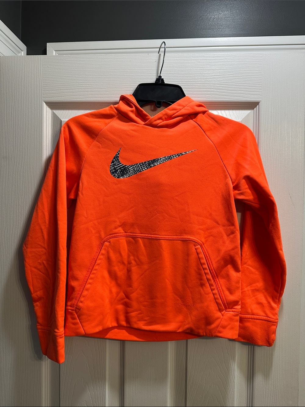 Nike Orange Hoodie with Black Patterned Swoosh